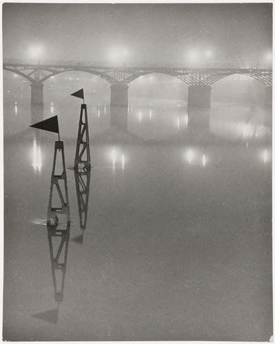 Brassaï (1899-1984) Le Pont des Arts, ca. 1932: Brassaï (1899-1984) Le Pont des Arts, ca. 1932Gelatin silver print, printed later. Titled and annotated by Gilberte Brassaï in ink with Rue Faubourg St. Jacques copyright credit reproduction l