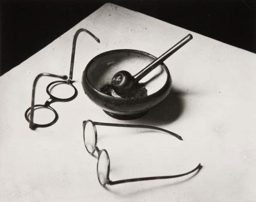 André Kertész (1894-1985) "Mondrian's Glasses and: André Kertész (1894-1985) "Mondrian's Glasses and Pipe, 1926""Gelatin silver print, printed ca. 1970. Signed and dated in pencil on the verso. 7 3/4 x 9 5/8 in. (19.7 x 24.4 cm.). Literature: