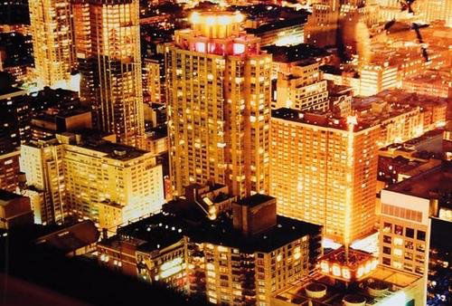 David Drebin (b. 1970) "Gold City, 2006": David Drebin (b. 1970) "Gold City, 2006"Chromogenic print. Signed in ink on label affixed to the reverse of the frame. This work is number 1 from an edition of 10. 30 x 40 in. (76.2 x 101.6 cm