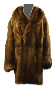 GOREY, Edward (1925 - 2000) Fur Coat owned and wor: GOREY, Edward (1925 - 2000) Fur Coat owned and worn by Edward GoreyFisher coat, below knee, extra-long sleeves, big 4" cuffs rolled back. Label sewn in celebrating the 2010 Annual Goreyfest and Gala.