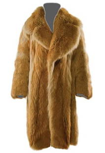GOREY, Edward (1925 - 2000) Fur Coat owned and wor: GOREY, Edward (1925 - 2000) Fur Coat owned and worn by Edward GoreyGolden-dyed coyote, designed by HBH New York, beige wool lining, extra large lining, long hair, below knee length. Label sewn in