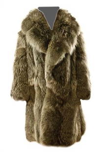 GOREY, Edward (1925 - 2000) Fur Coat owned and wor: GOREY, Edward (1925 - 2000) Fur Coat owned and worn by Edward GoreyA Finnish Racoon coat, dyed green with green woolen lining and extra-large lapels. Very long and heavy. Label sewn in celebrating