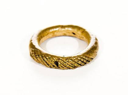 GOREY, Edward (1925-2000) Large Metal Ring: GOREY, Edward (1925-2000) Large Metal RingA tooled metal ring, approx 1 1/4 in diameter. Provenance: Edward Gorey to the Edward Gorey Charity Trust, Accompanied by a letter signed by Andreas Brown,