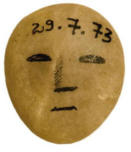GOREY, Edward (1925-2000) Rock with Painted Face: GOREY, Edward (1925-2000) Rock with Painted FaceInk on stone; dated "29.7.73." Provenance: James Marshall. Evidently Edward Gorey found this stone on the beach, drew on it and presented it to his