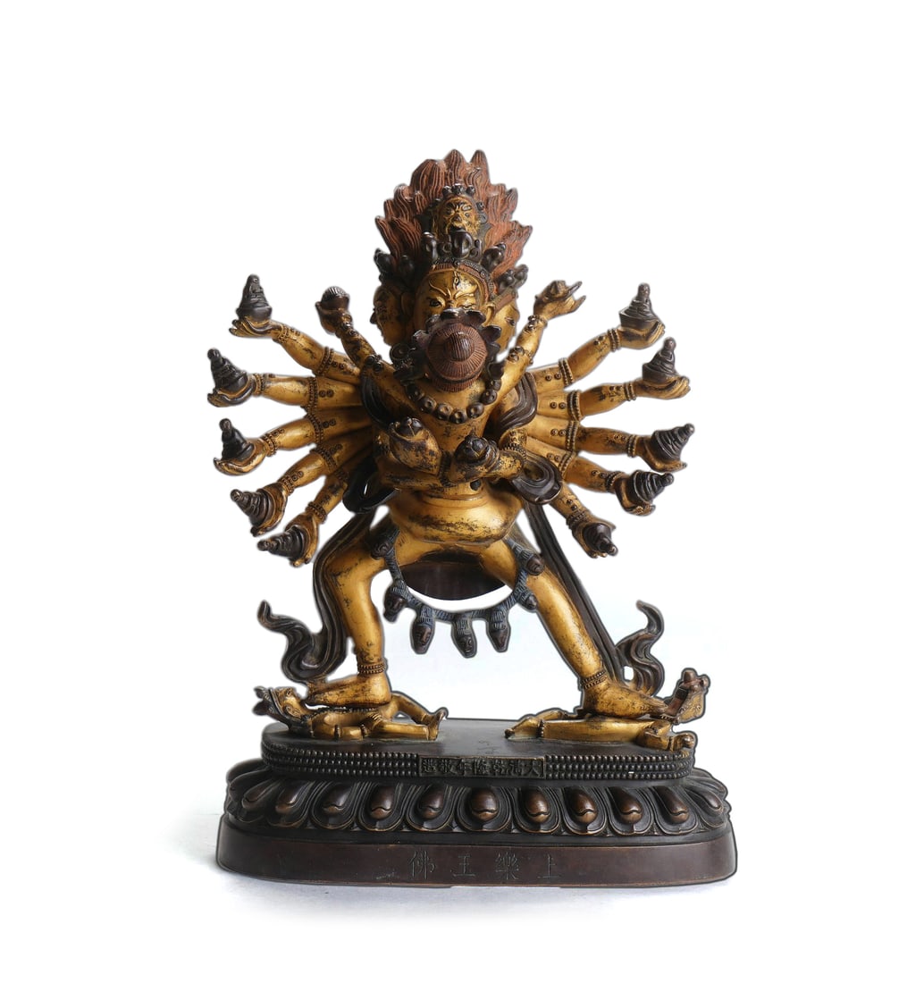 Qing Dynasty Gilt-Bronze Figure of Yamantaka: H :21.5cm W :14cm This Qing Dynasty Gilt-Bronze Figure of Yamantaka is exquisitely crafted. As a core yidam of the Gelug School in Tibetan Buddhism, it is fully gilt-bronze, with a rigorous nine-head