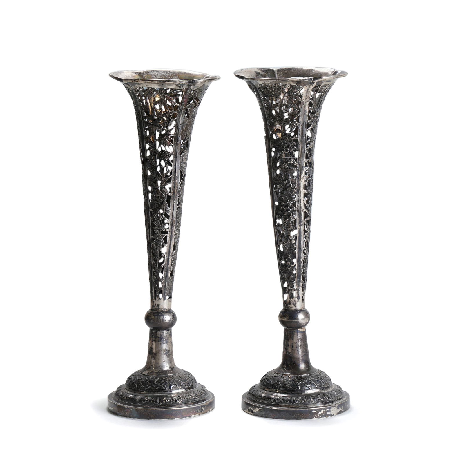 Silver Openwork Floral-Patterned Flower Vases: H :24cm W :8cmWeight :313g This pair of Republic of China Silver Openwork Floral-Patterned Flower Vases is exquisitely crafted. They have a flower vase shape, with pure silver and delicate openwork te
