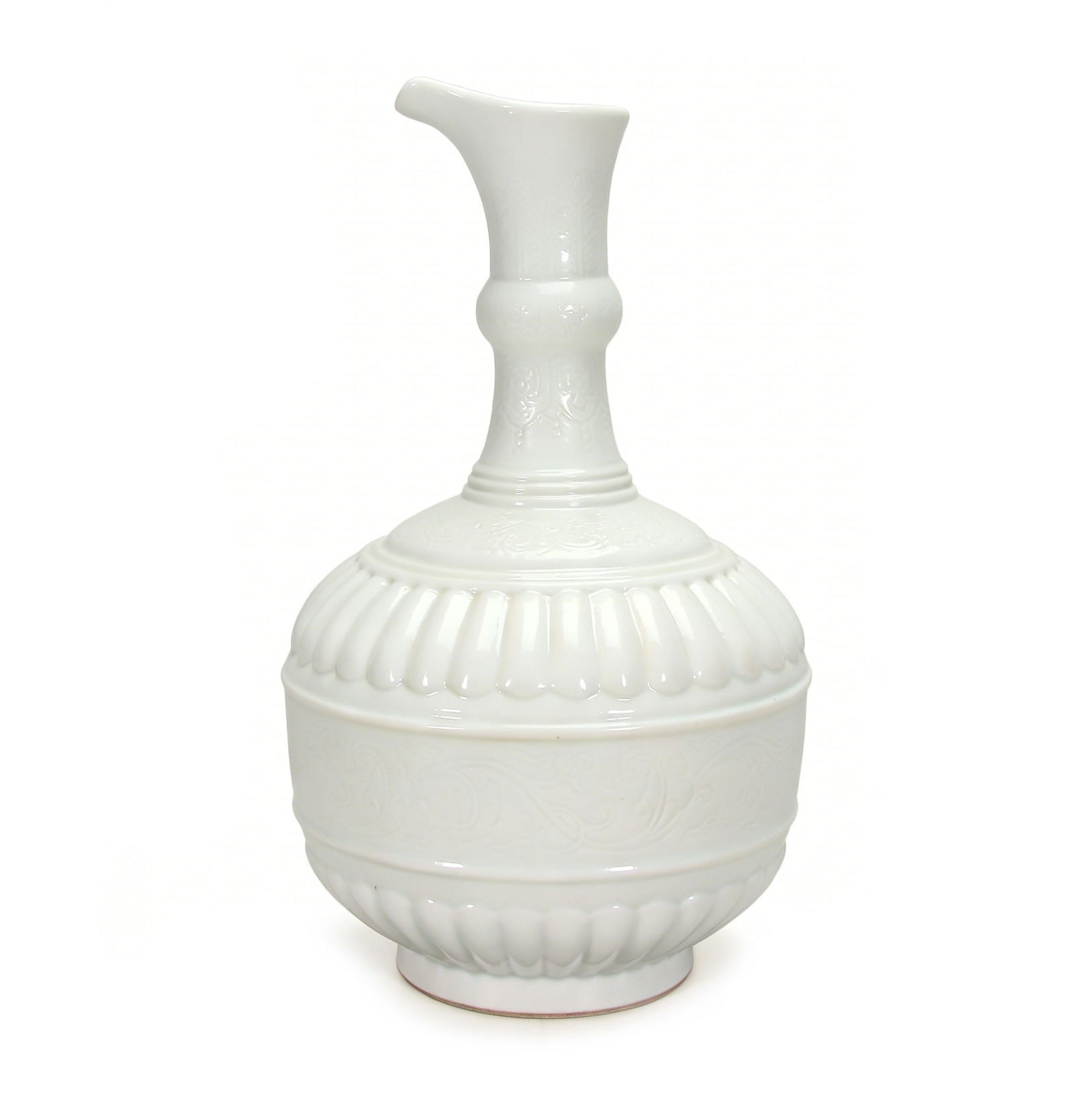 A Fine Chinese White-Glazed Incised Porcelain Ewer, Mark and Period of Yongzheng: H :25.3cm The ewer has a bulbous body, a tall, slender neck with a raised bulbous knop, and a curved, flared spout. The well-proportioned shape and balanced silhouette reflect the refined aesthetic of