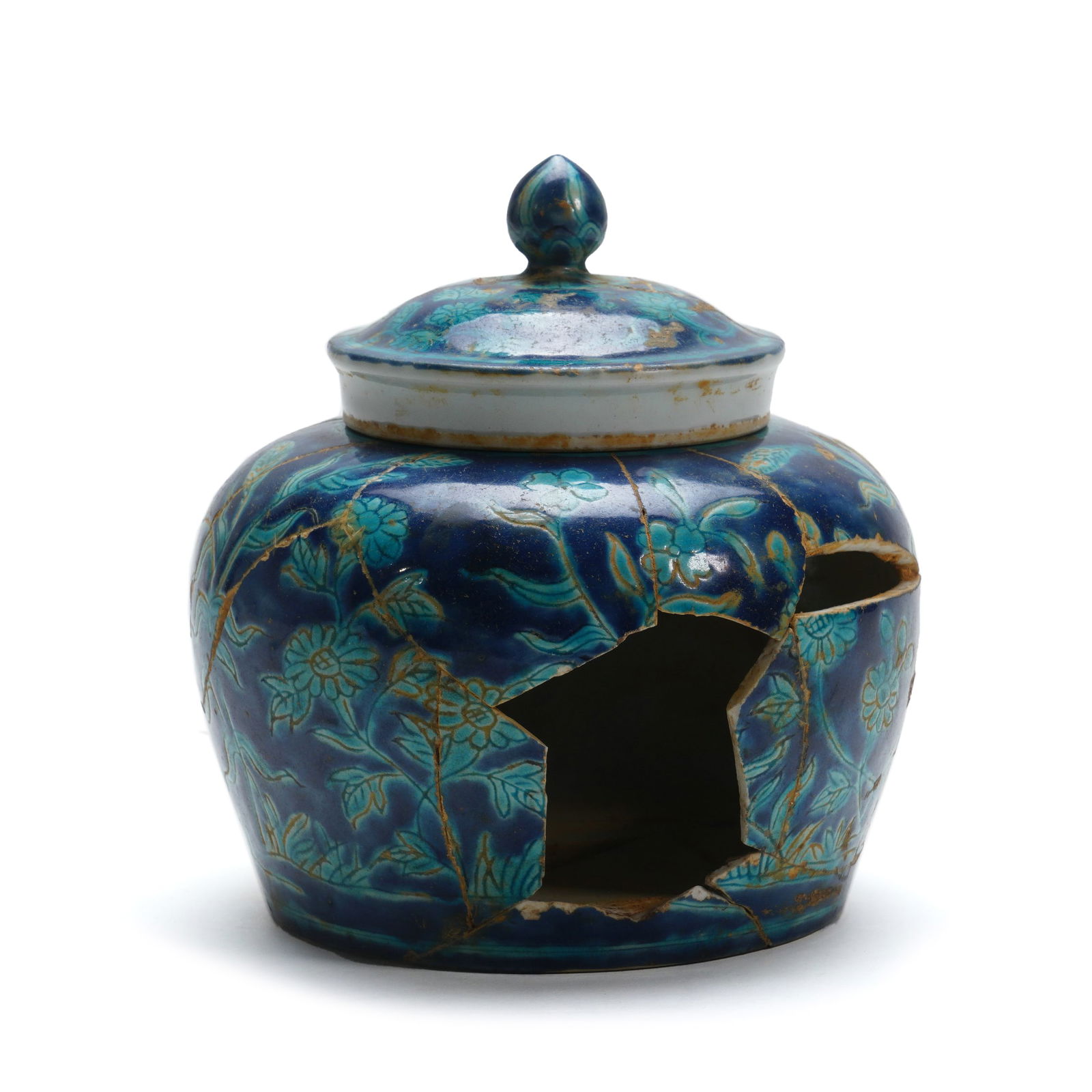 A Rare Ming Dynasty Xuande Mark and Period Fahua Glazed Jar: H :14cm W :13cm This important fragmentary jar is a rare example of Xuande period Fahua ware. It is decorated with vibrant turquoise floral scrolls against a deep cobalt-blue ground, with the cover ma