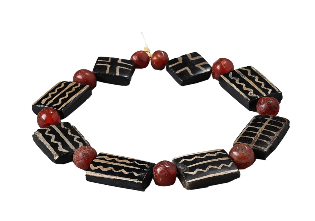 Southeast Asian Burmese Antique Pumtek Bead Bracelet with Rare Zigzag Pattern: An antique bracelet featuring traditional Pumtek beads from Burma, known for their distinct fossilized wood composition. This piece showcases a rare zigzag pattern.Weight :38 g