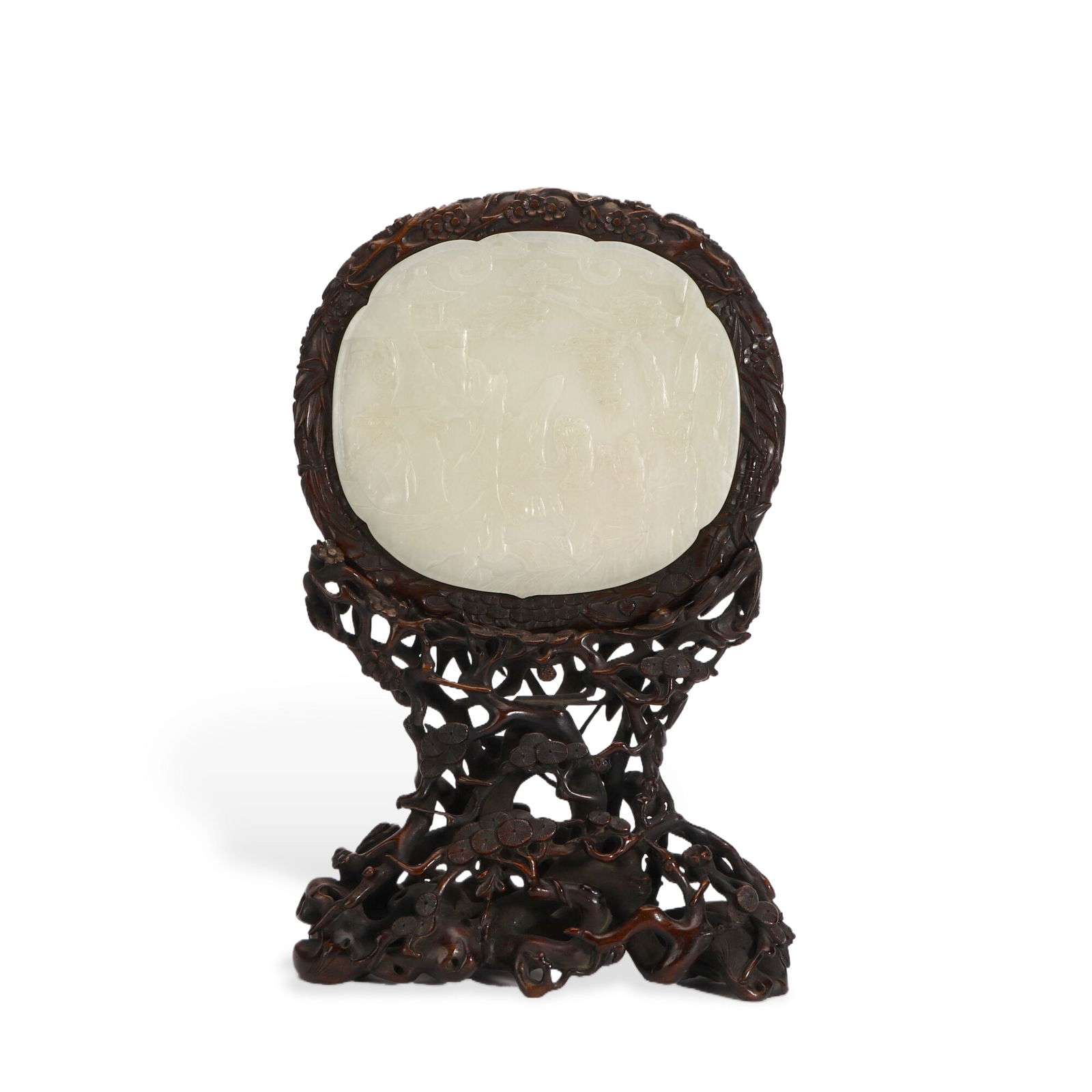 A Fine Qing Dynasty Pale Celadon Jade Table Screen Carved with Scholars Beneath Pines, Fitted with a: H :27cm W :18cm This elegant table screen is finely carved from pale celadon jade, depicting scholars in a tranquil pine landscape. The jade is of even, translucent tone, with delicate relief work