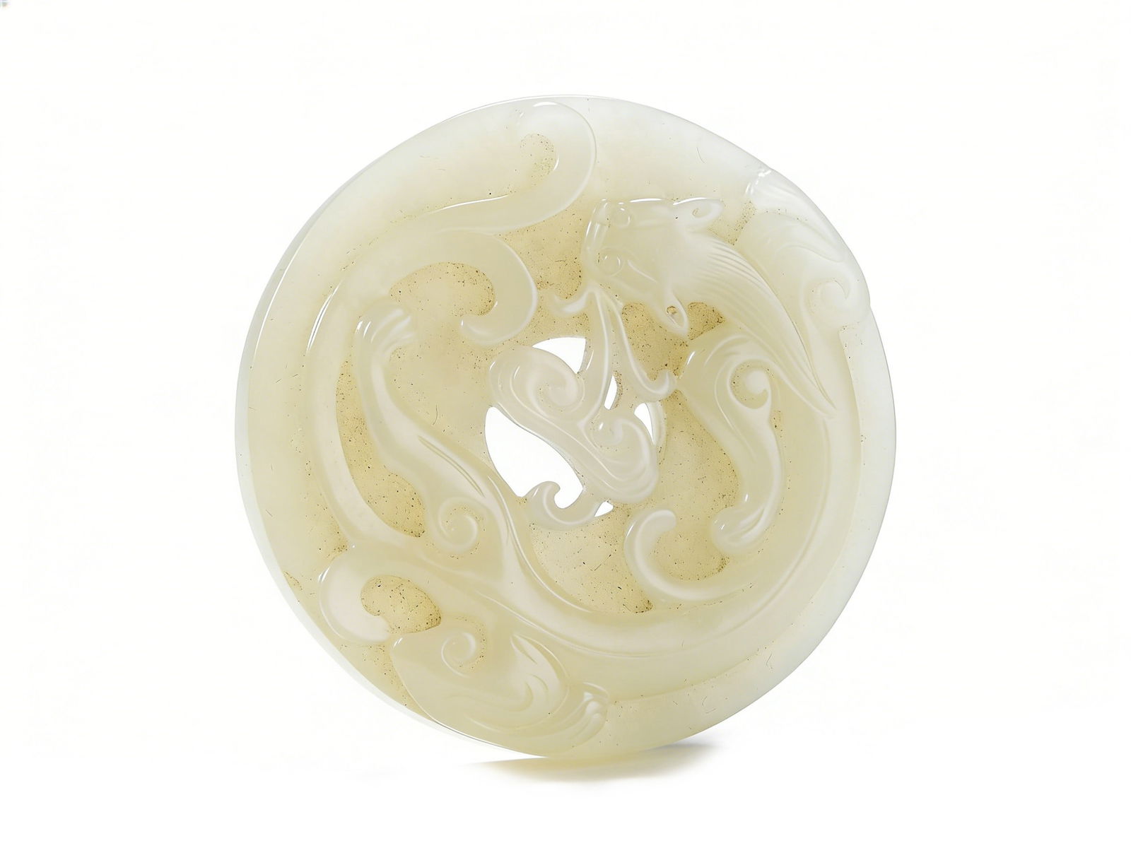 A QING DYNASTY HETIAN WHITE JADE BI-SHAPED PENDANT CARVED WITH OPENWORK CHILONG PATTERN (1 of 2)