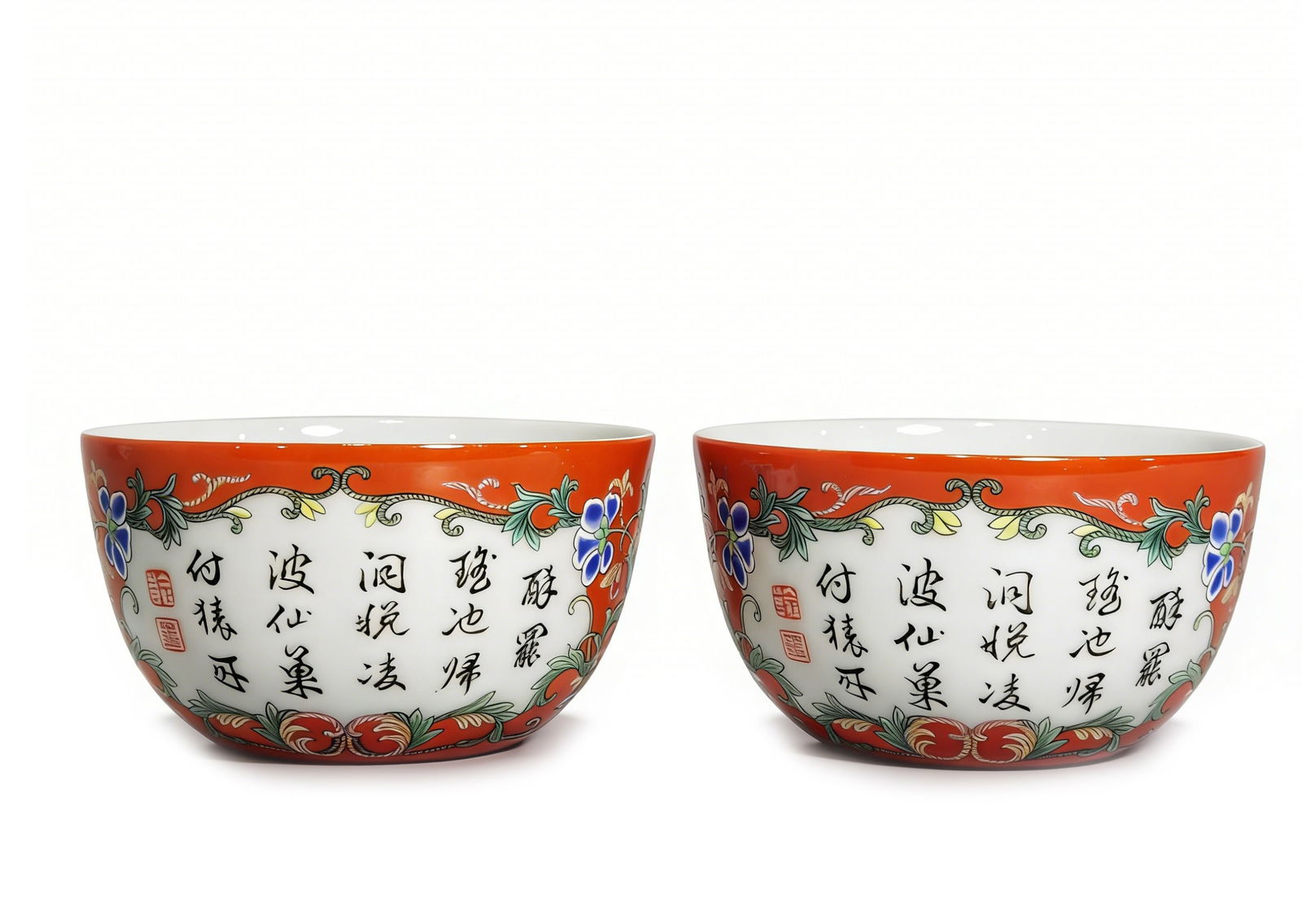 Qing Dynasty, Qianlong Period Famille RoseInterlocking Floral PatternsRecessed-base Cup: D :8.6cm H :4.7cm A fine pair of Chinese Qing Dynasty coral-ground famille rose porcelain bowls, Guangxu period, decorated with floral scrolls and calligraphic cartouches. Well-matched pair, excellent