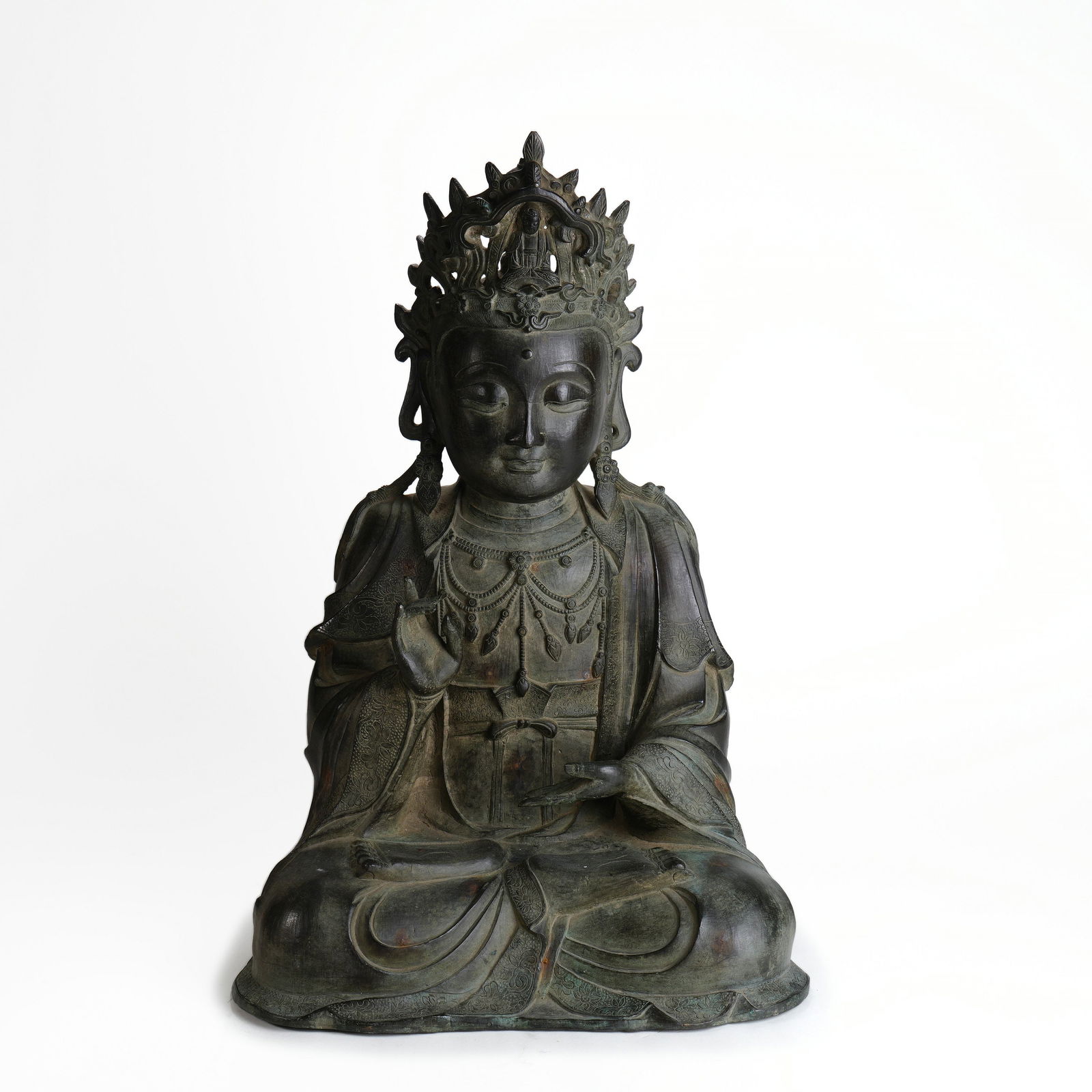 Ming Dynasty Bronze Seated Guanyin Bodhisattva: H :55cm W :37cm This Ming Dynasty Bronze Seated Guanyin Bodhisattva is exquisitely crafted. Made of bronze, the statue is in a full-lotus seated posture, decorated with a precious crown and ornaments,