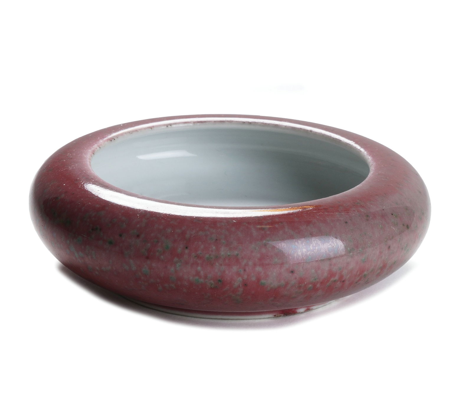 Qing Kangxi Cowpea Red Glazed Tangluo Washer: H :4cm W :12cm This Qing Kangxi Cowpea Red Glazed Tangluo Washer is exquisitely crafted. The washer is coated with cowpea red glaze, featuring a gentle and elegant color and dynamic kiln variation on