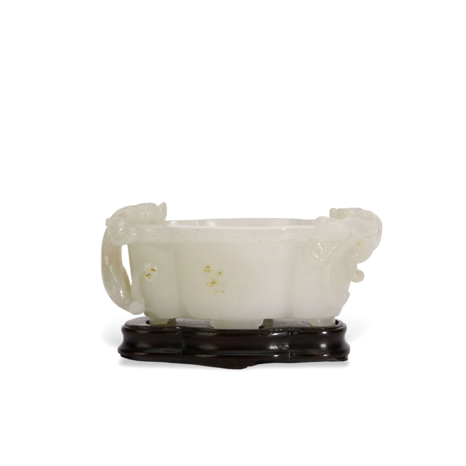 A Fine Qing Dynasty Jade Brush Washer of Quatrefoil Form with Chilong Dragon Handles: L :8cm H :4.5cm This elegant brush washer is masterfully carved from a single block of pale celadon jade of exceptional whiteness and translucency. It is of quatrefoil form, flanked by two finely deta