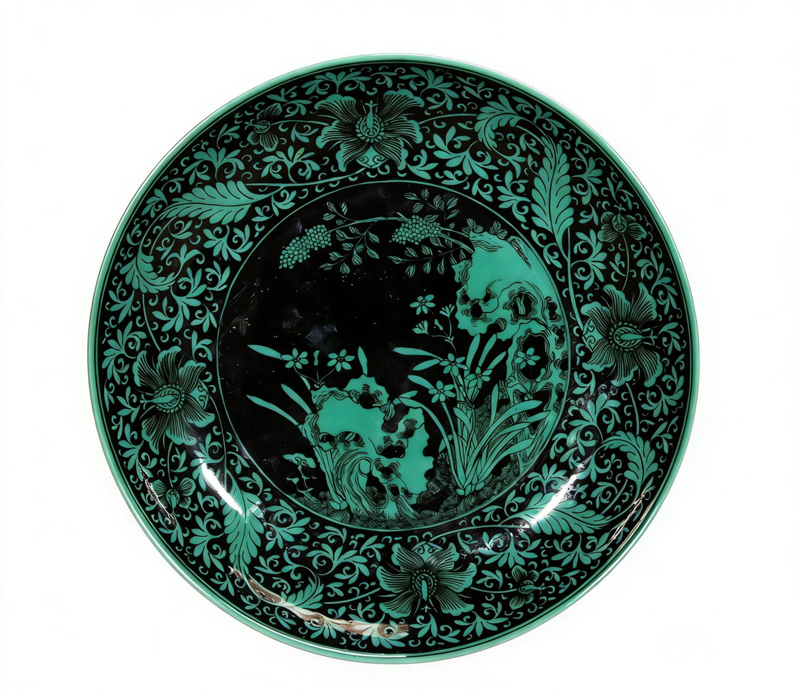 A Fine Chinese Black-Ground Turquoise-Glazed Porcelain Dish with Floral and Rockwork Decoration, (1 of 2)