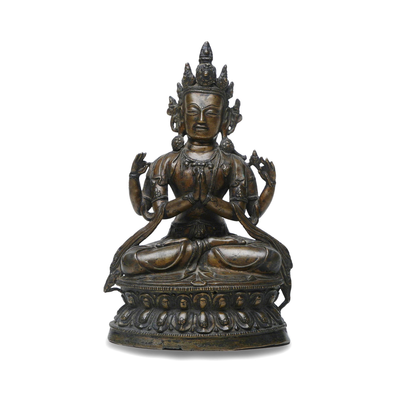 Ming Dynasty Bronze Seated Figure of Four-Armed Avalokite?vara: H :18.5cm W :11cm This sculpture is a seated figure of Four-Armed Avalokite?vara in the Tibetan Buddhist style from the Ming Dynasty, entirely cast from fine bronze with a thick, rich patina and a dee
