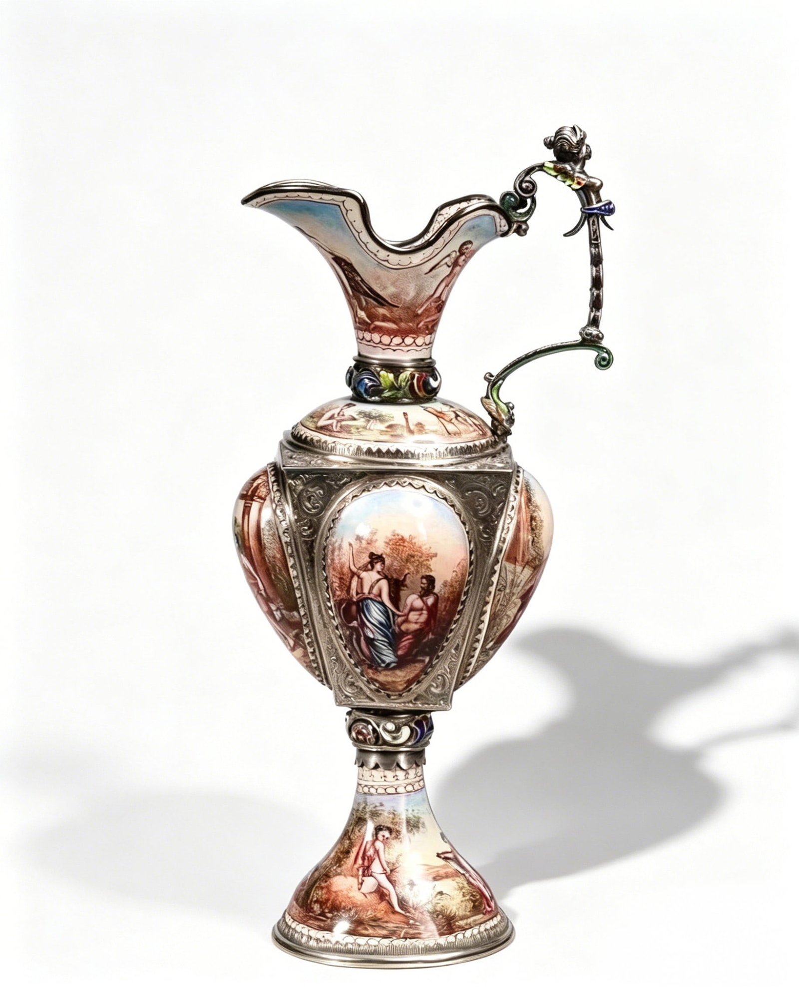 Austro-Hungarian Viennese Silver & Miniature Painted Enamel Footed Ewer: H:19cm D:8cm Weight:232g Period: Circa Late 19th Century, Austro-Hungarian Empire (1867?C1918), ViennaMaterial: Solid Silver Chased Body, Hand-Painted Polychrome Translucent EnamelDescription: