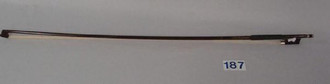 CHARLIE DANIELS MODEL FIDDLE BOW,: AUTOGRAPHED BY CHARLIE DANIELS, HAIRS ON BOW ARE WORN, 29 INCHES LONG, BOW IS EXCELLENT