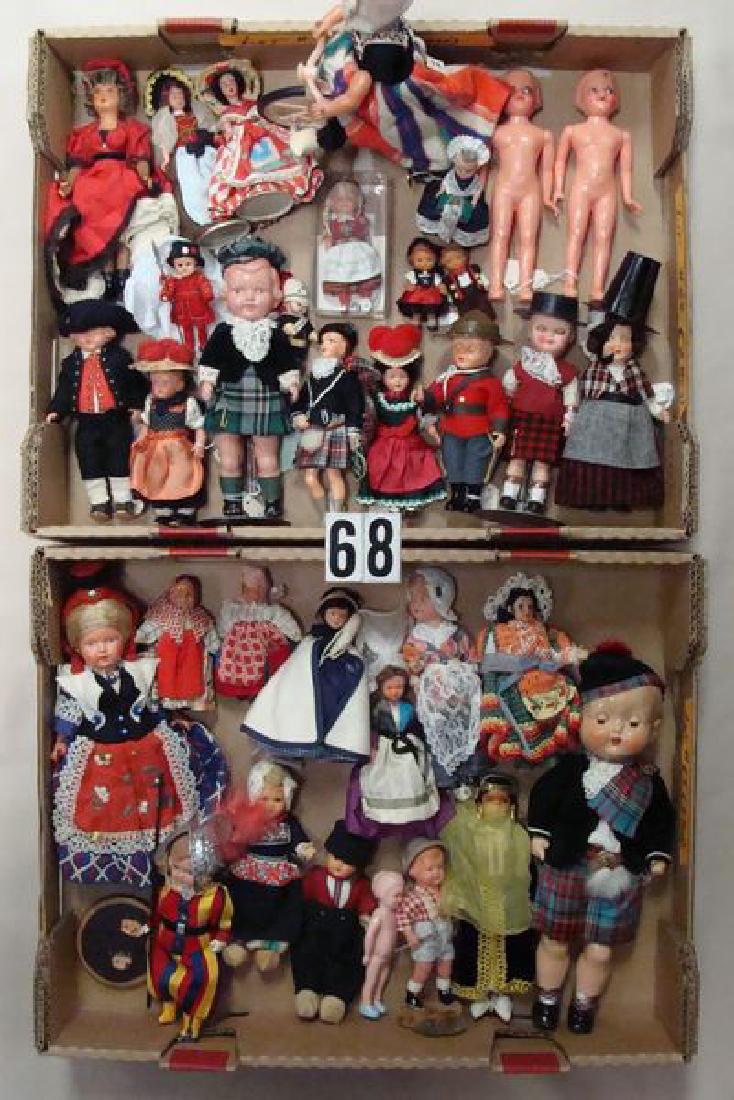 (2) BOXES: LARGE SELECTION OF ASSORTED SIZE CELLULOID &: CELLULOID & HARD PLASTIC DOLLS DRESSED IN ETHNIC OUTFITS (34 PCS.), ONE IS AS-IS (FEET BROKEN OFF), THE REST ARE VERY GOOD TO EXCELLENT, INFO CARDS FROM THE LIBRARY COLLECTION ARE INCLUDED