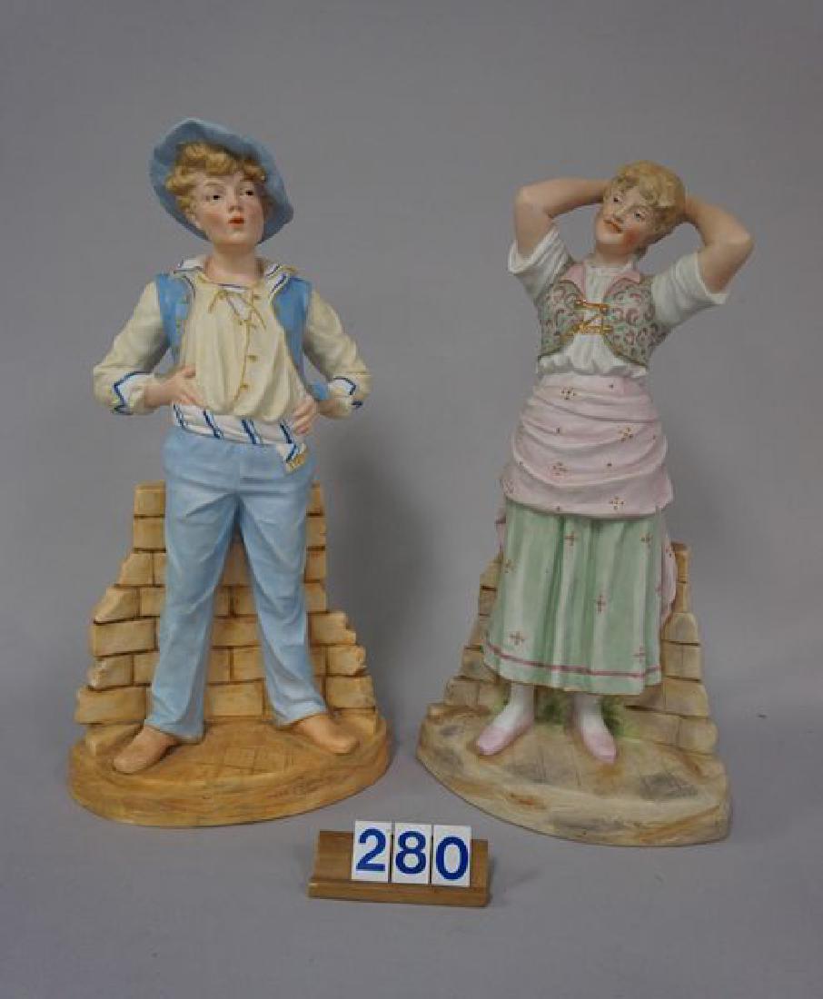 PAIR OF 15 INCH HEUBACH (NOT SIGNED) BISQUE FIGURINES,: BISQUE FIGURINES, EACH POSED ON A BASE WITH BRICK WALL TYPE BACKGROUND, BOY IS WHISTLING & YOUNG GIRL HAS HER ARMS ABOVE HER HEAD WITH HER HANDS FOLDED TOGETHER ON THE BACK OF HER HEAD, NO DAMAGE OR R