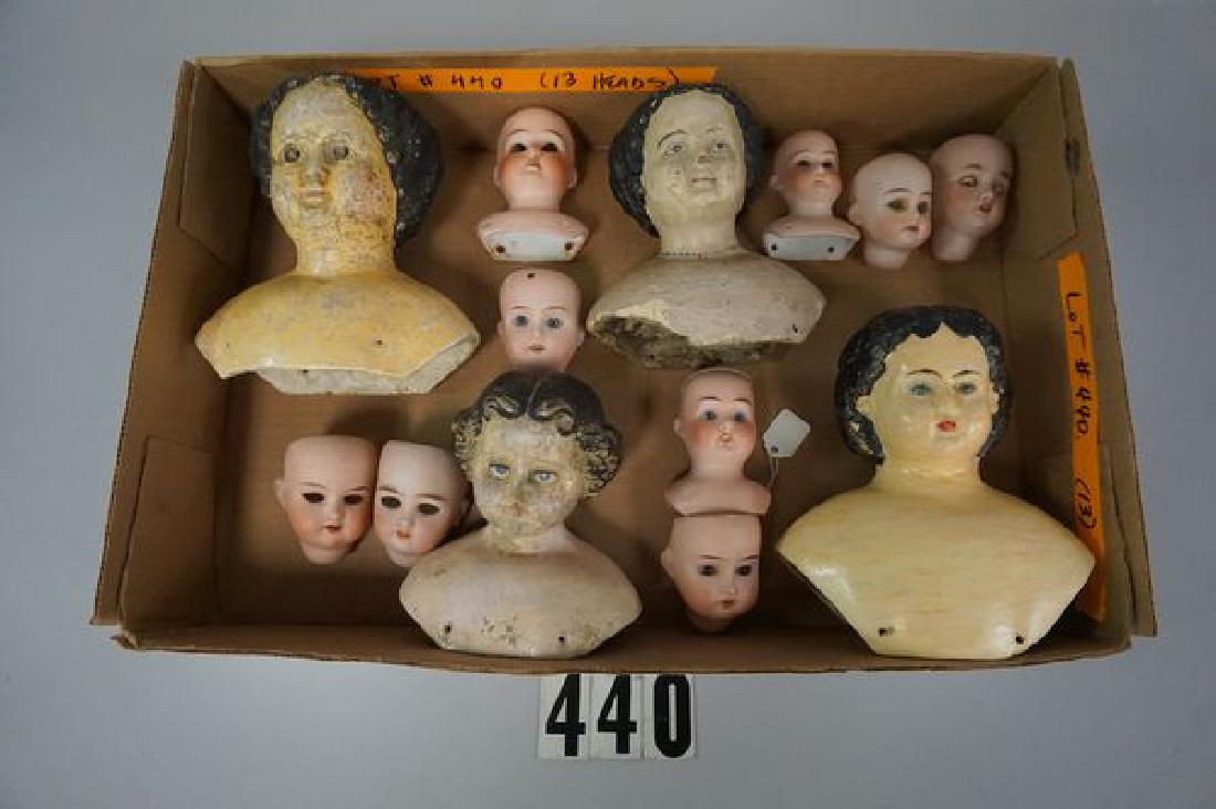 (4) PAPIER MACHE SHOULDER HEADS (GREINER, ETC.), (3) AS: (GREINER, ETC.), (3) AS FOUND & NEED RESTORATION, (1) WITH MACHE RESTORATION THAT NEEDS TO BE PROFESSIONALLY REPAINTED & (9) ASSTD. SMALLER SIZE BISQUE HEADS THAT APPEAR TO BE FREE OF DAMAGE OR REPAIR