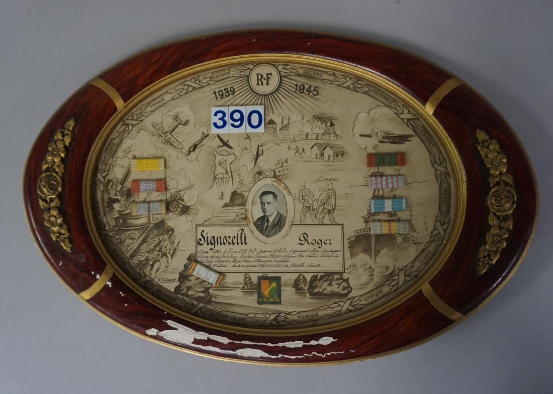 FRENCH OVAL FRAME WITH SERVICE RECORD: OF ROGER SIGNORELLI, SERVED IN NIGER, AFRICA, INDO CHINA, SYRIA, ALGERIA, COLONIAL GERMAY, ETC., COMES WITH EIGHT RIBBONS, FRAME WITH SOME LOSSES, DOCUMENT (AS FOUND) IS 21 IN. X 14 IN. - GOOD