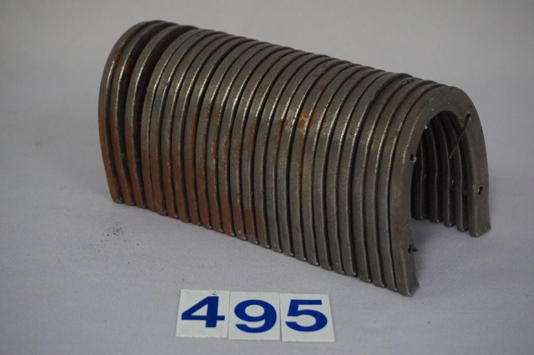 HEEL IRONS BOUND IN TWENTY FOUR PIECES,: UNISSUED, RUST ON SOME - GOOD TO VERY GOOD