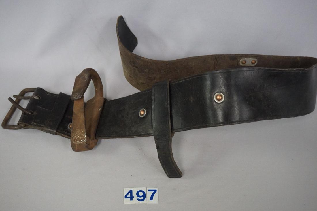 PARATROOPER'S PIONEER BTL. MARKED: LINEMAN BELT, HEAVY LEATHER, 3 1/4 IN. W, 45 IN. LONG WITH LOOPS & HOOK FOR WIRE & UTILITY WORK, USED BUT GOOD CONDITION, LEATHER WOULD CLEAN UP NICELY - IRON PARTS ARE RUSTY