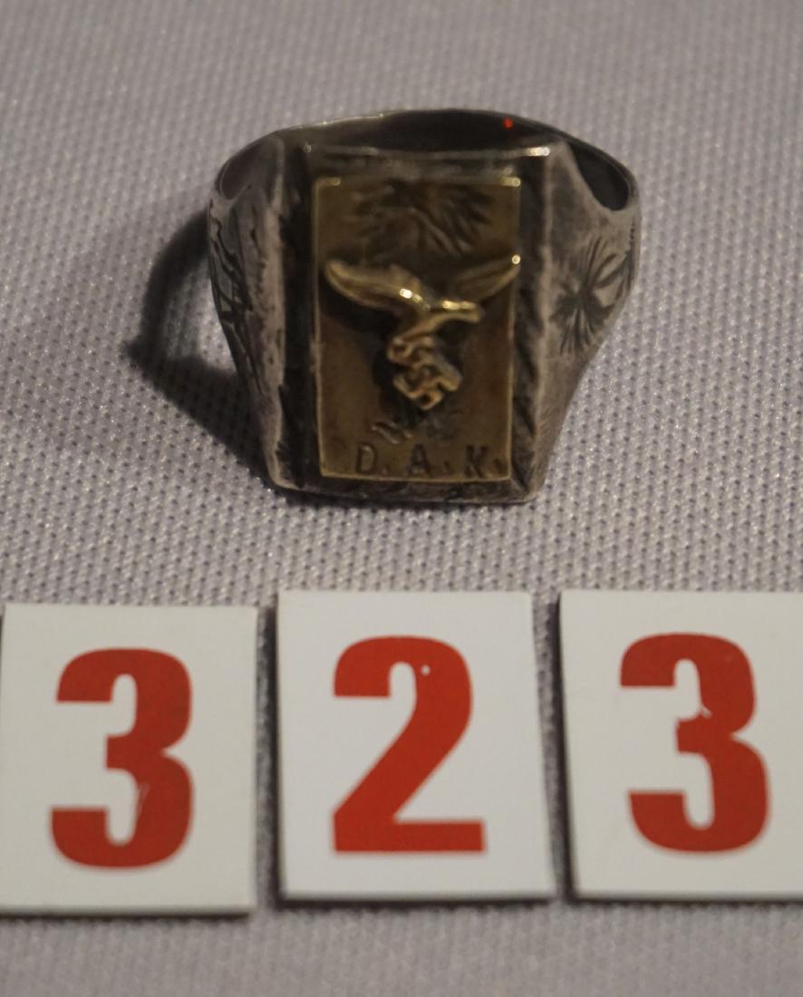 AFRIKA DAK SILVER RING FOR LUFTWAFFE,: RING IN SILVER WITH PALM ON ONE SIDE & A CAMEL ON THE OTHER, ON TOP IS A PLATE, PROBABLY BRASS, WITH PALM DAK & A LUFT EAGLE WITH SWASTIKA, THIS WAS A PRIVATE PURCHASE NATIVE MADE FOR GERMAN FORCES, S