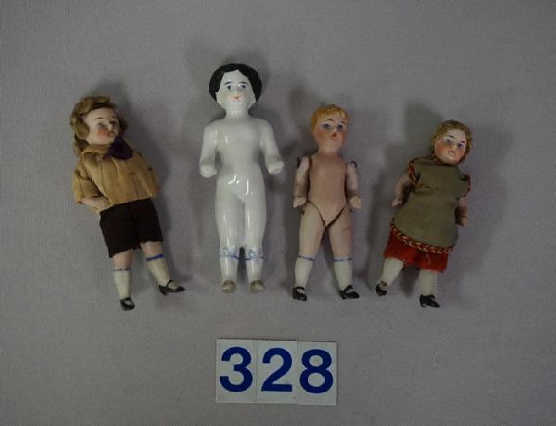 (4 PIECES) (3) 3 1/2 INCH ALL BISQUE DOLL: HOUSE DOLLS: WITH ORIGINAL WIGS & OUTFITS, (1) NUDE WITH MOLDED & PAINTED HAIR & 4 1/4 IN. FROZEN CHARLOTTE WITH PAINTED BLUE RIBBONS ON LOWER PORTION OF LEGS - EACH FREE OF DAMAGE OR REPAIR - GOOD TO