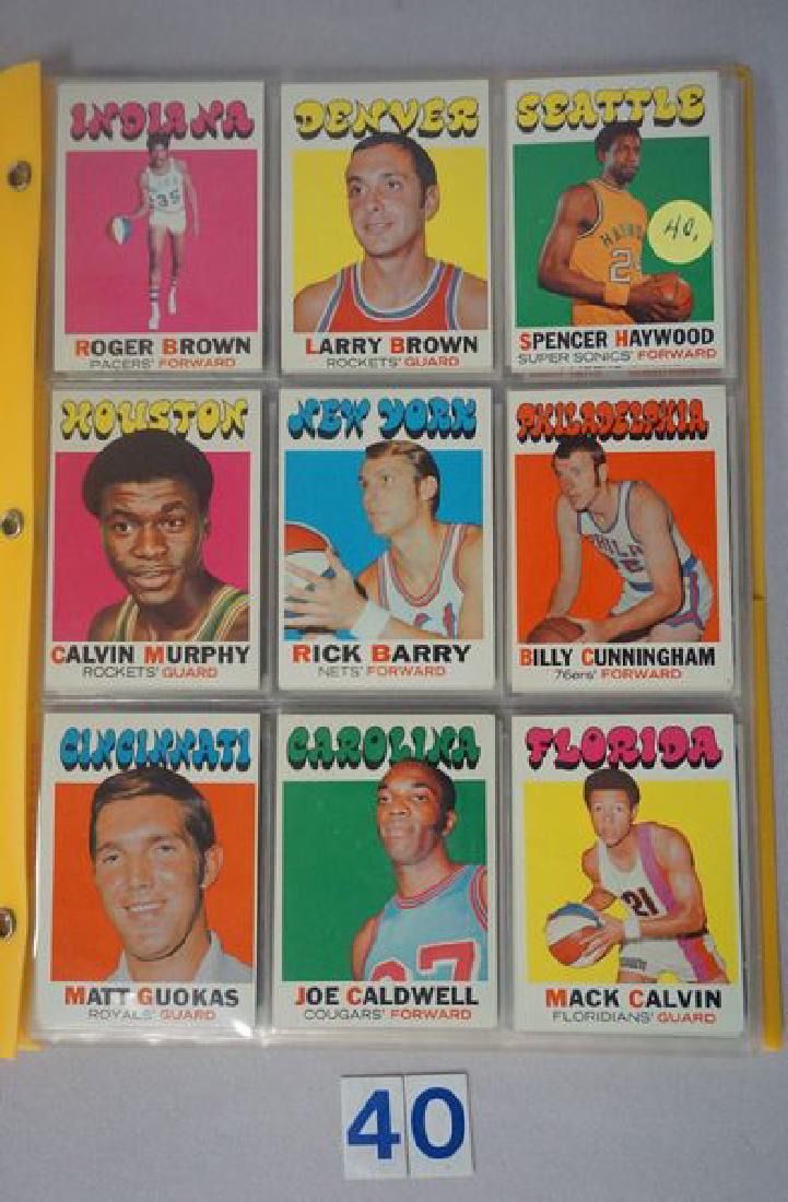 FOLDER WITH (67) TOPPS BASKETBALL ROOKIES: & STARS: (25) 1971-'72 INCLUDG. #20, 79, 152, 170 & OTHERS, (16) 1972-'73 INCLUDG. #32, 183, ETC., (9) 1973-'74 INCLUDG. #48, 103, 206, ETC., (1) 1974-'75 #39 (R) B. WALTON, (7) 1975-'76 #50, 302, ETC