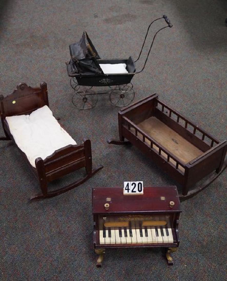 (4 PIECES) SCHOENHUT DOLL'S WOODEN PIANO: WITH ORIGINAL DECAL, FANCY FRONT METAL LEGS, ETC., AS FOUND, 12 IN.H, 14 IN. W, 8 1/2 IN. D - POOR TO FAIR & DOLL STROLLER WITH METAL RIM WHEELS & WIRE SPOKES, ORIGINAL WOODEN BODY WITH STENCIL DECOR,