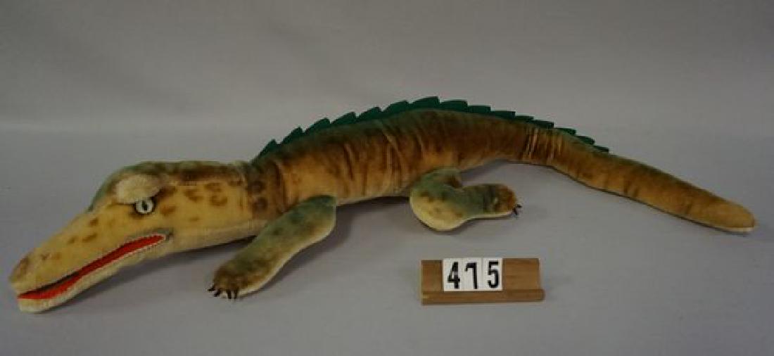 STEIFF 28 INCH MOHAIR ALLIGATOR: NAMED 'GATY', SCARCE & COLORFUL AIR-BRUSHED STRAW STUFFED MOHAIR, ORIGINAL GLASS EYES, GREEN FELT SEWN INTO SPINE, RED FELT OPEN MOUTH HAS A WORN AREA ON THE BOTTOM PORTION OF MOUTH, ALL FELT CLAWS AR