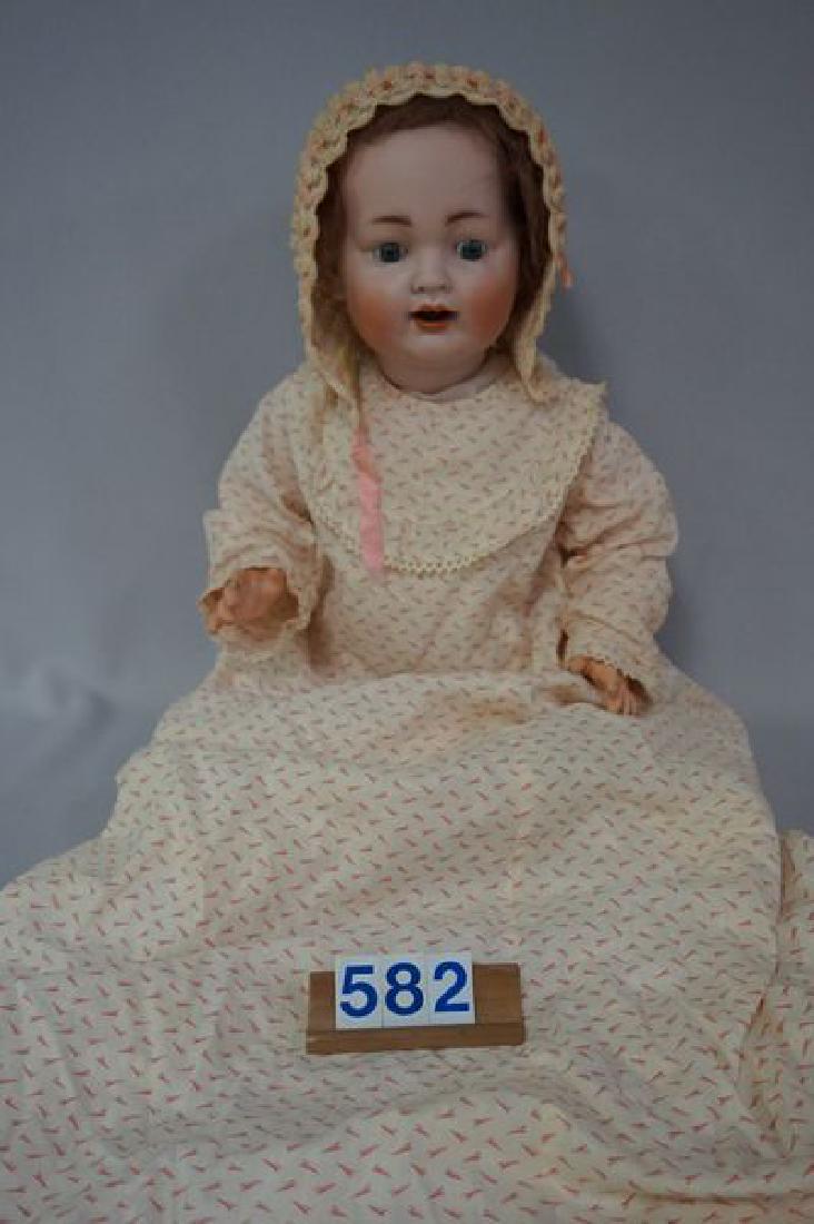 KOENIG & WARNICKE 99/11 20 INCH BISQUE SOCKET: HEAD BABY WITH SLEEP EYES, OPEN MOUTH, TWO TEETH, CHARACTER FACE, FIVE-PIECE BENT LIMB COMPO BODY, REAR SIDE OF HEAD NEAR THE CROWN HAS AN AREA OF AIR-BRUSH TOUCH-UP, DOES NOT APPEAR TO HAVE BEEN BROK