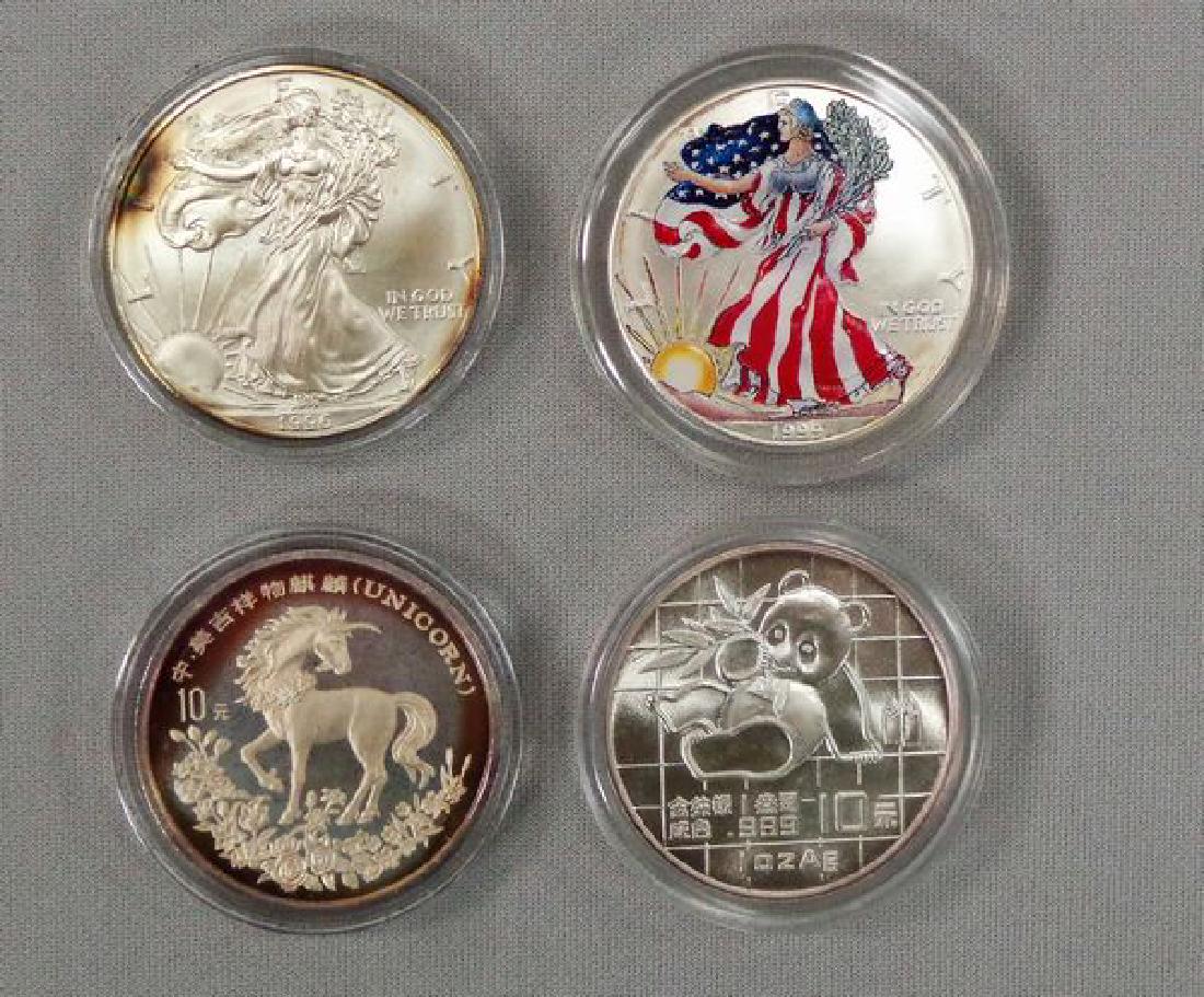 (2) SILVER EAGLES & (2) SILVER ROUNDS: (1 of 3)