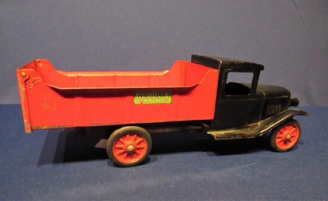 BUDDY L DUMP TRUCK:: CIRCA 1920'S - 30'S, BLACK BODY, RED DUMP BODY, 21 IN. TOY TRUCK, RARE BODY STYLE - ORIGINAL PAINT SHOWS WEAR