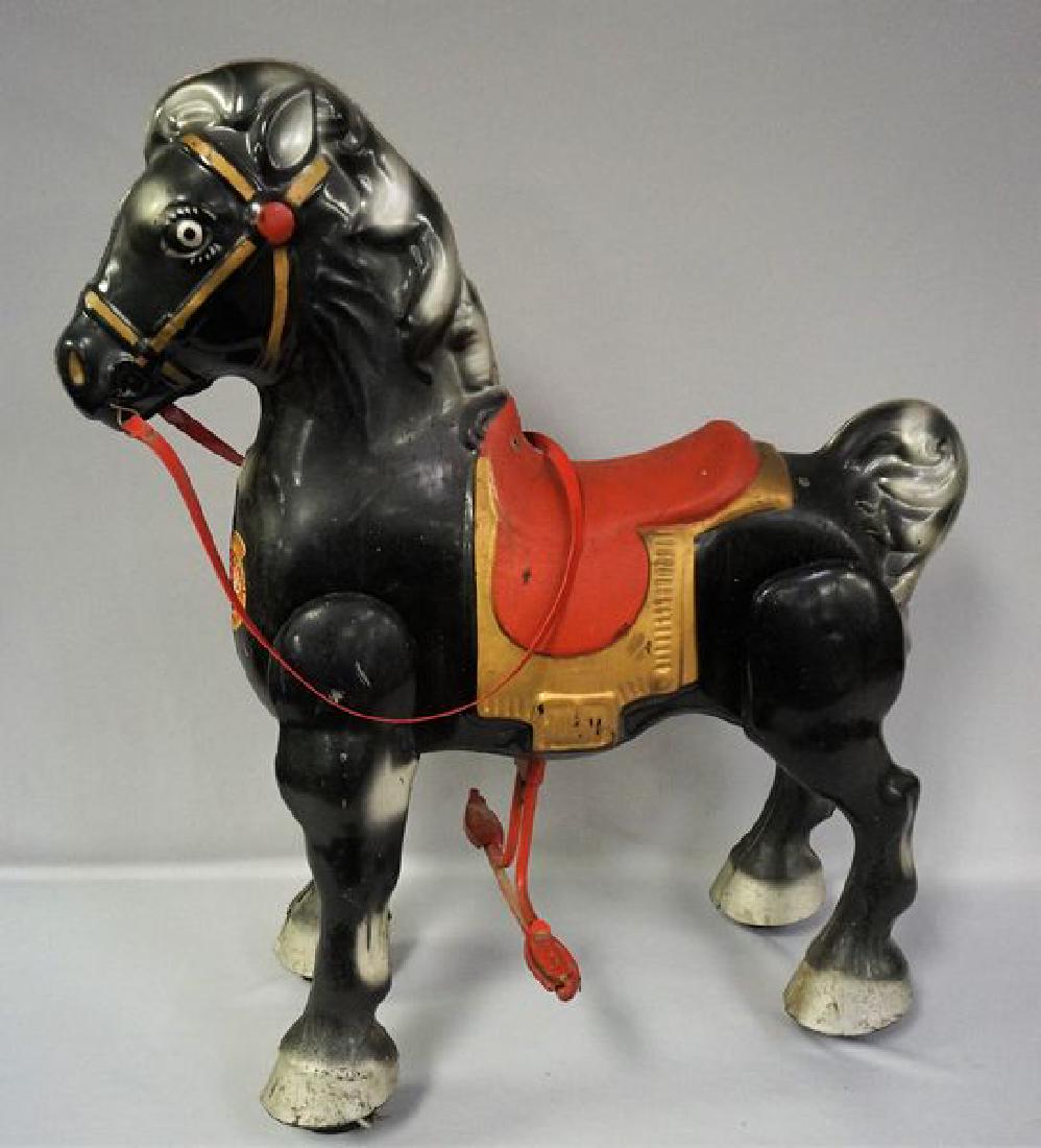 MOBO BRONCO PRESSED STEEL RIDE-ON: HORSE, 27 IN. W, 31 IN. H, MANUFACTURED BY D. SEBEL & CO. LTD., KENT, ENGLAND, TOY IS ALL ORIGINAL, NO MISSING PIECES, SOME OVERALL SCRATCHES & WEAR FROM USE, NO TOUCH-UPS, WORKING ORDER - GOOD