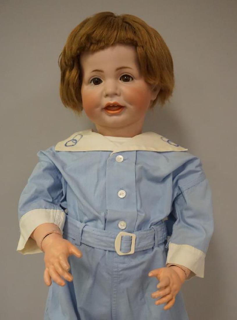 K STAR R 27 INCH SIMON & HALBIG 116 / A 62 BISQUE: K STAR R 27 INCH SIMON & HALBIG 116 / A 62 BISQUE CHARACTER FACE SOCKET HEAD, OPEN / CLOSED MOUTH, LAUGHING, TWO MOLDED & PAINTED UPPER TEETH, SLEEP EYES, MOHAIR WIG, BODY WAS REPAINTED, COMPO LOSS AT