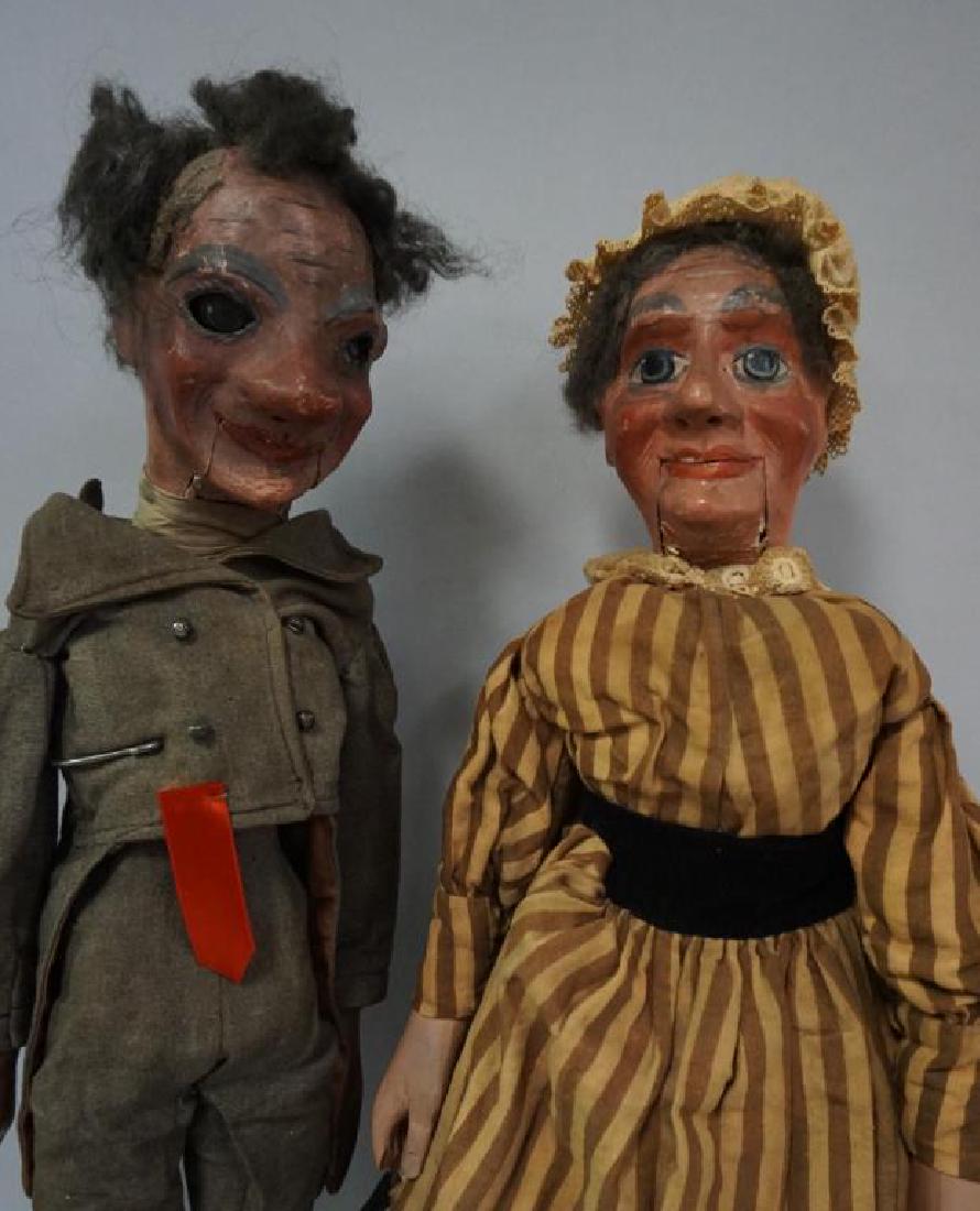 (2 PIECES) PAPIER MACHE HEAD VENTRILOQUIST DOLLS: 26: (2 PIECES) PAPIER MACHE HEAD VENTRILOQUIST DOLLS: 26 IN. MAN WITH STRINGS ON REAR OF HEAD, ONE STRING RAISES HIS HAIR, THE OTHER STRING FOR EYES / MOUTH IS NOT WORKING & 24 IN. WOMAN, NO VISIBLE STRIN