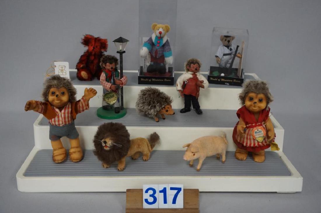 LOT (5) HEDEGHOG FIGURINES INCLUDES, STEIFF 4 1/2 IN.: LOT (5) HEDEGHOG FIGURINES INCLUDES, STEIFF 4 1/2 IN. MICKIO MUCKI, (2) PETER FIGURINES - FAIR TO GOOD, W. GERMAN LION, PIG & HEDGEHOG ANIMAL FIGURES - VERY GOOD, & (3) HANDMADE MINIATURE BEARS - EXCE
