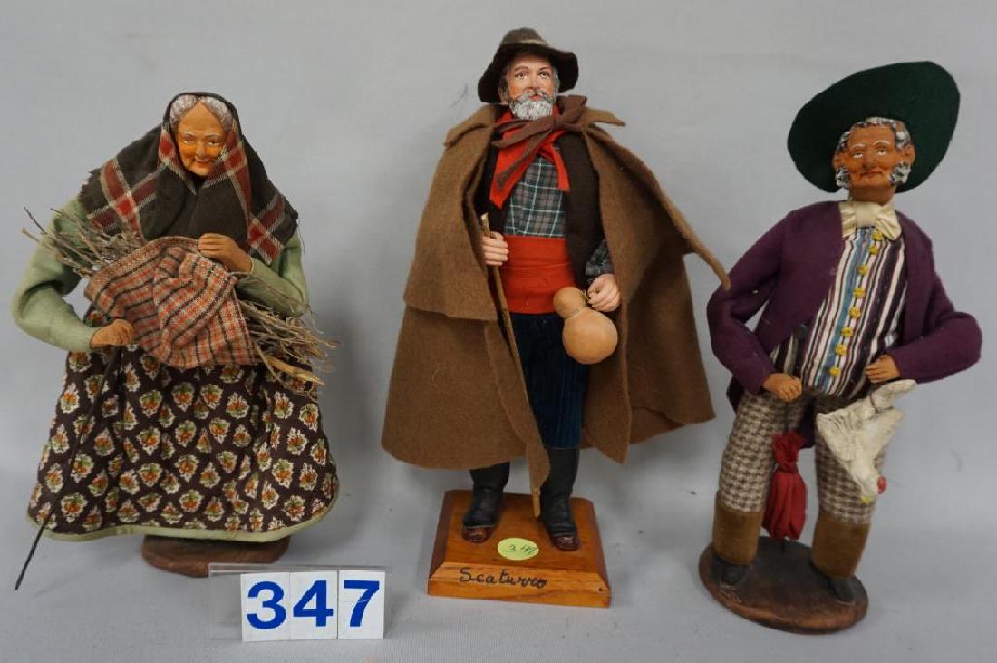 (2) SANTONS OF FRANCE, HANDMADE TERRACOTTA DOLLS: 7 3/4: (2) SANTONS OF FRANCE, HANDMADE TERRACOTTA DOLLS: 7 3/4 IN. PEASANT WOMAN WITH CANE, GATHERING TWIGS AND 8 IN. OLDER GENTLEMEN WITH UMBRELLA AND CHICKEN, EACH SIGNED ON BASE - VERY GOOD & 9 IN. WELL-D
