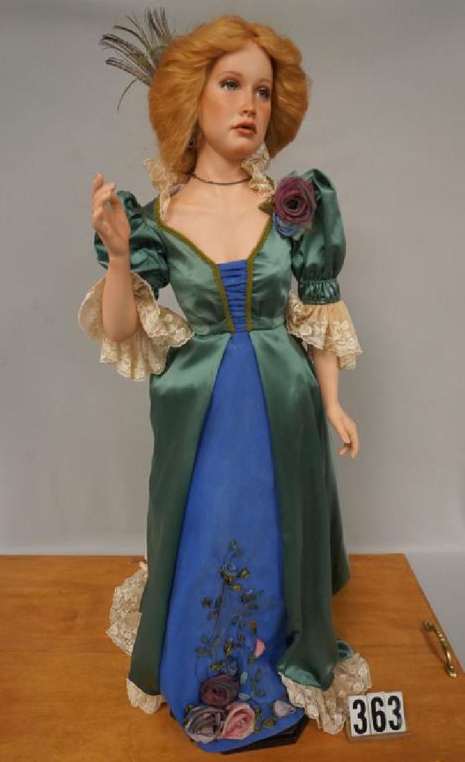 33 INCH VINYL ARTIST DOLL 21 / 35, SEE PHOTO FOR MARK,: 33 INCH VINYL ARTIST DOLL 21 / 35, SEE PHOTO FOR MARK, NOT SIGNED BY ARTIST, COMES WITH ACRYLIC DISPLAY COVER, 37 IN. H, 30 IN. W, 17 1/2 IN. D & WOODEN BASE WITH BRASS HANDLES - VG