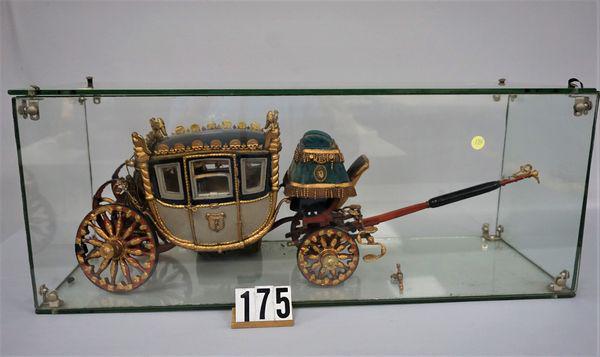 NAPOLEONIC COACH HAND CRAFTED BY GEORGE HARTMAN,: AN EARLY MEMBER OF THE FISHER BODY CRAFTSMAN'S GUILD & ENTERED IN COMPETITION WITH CERTIFICATE DATED JULY 1, 1933. WOODEN WHEELS ON THE REAR OF THE COACH & WOODEN FRAME NEED SOME ATTENTION & REPAIRS -