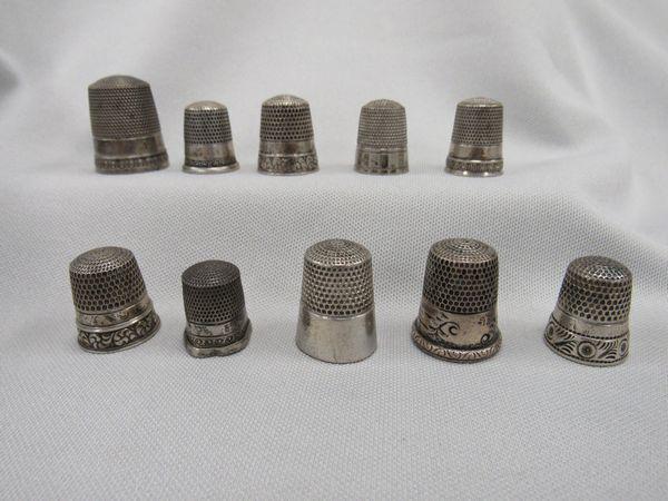 (10) STERLING SILVER THIMBLES:: VARIOUS SIZES. ONE THIMBLE DENTED OTHERWISE - VG