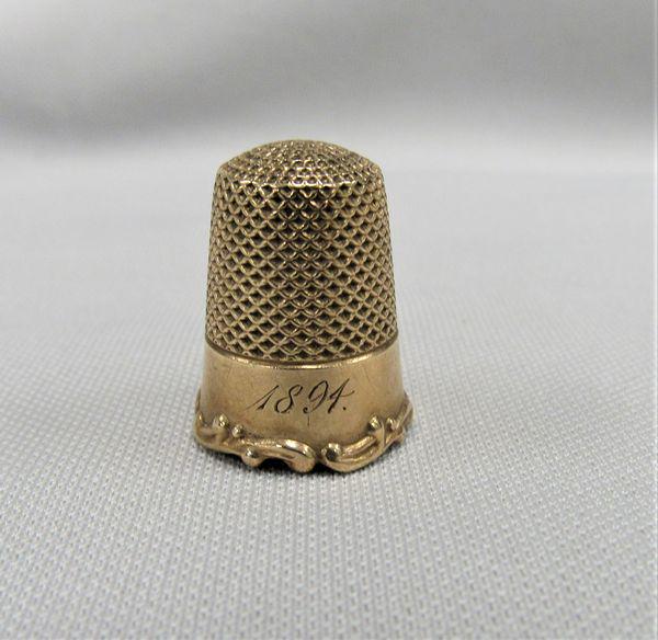14K GOLD THIMBLE:: STAMPED 14K. DATE ENGRAVED 1894. SIZE 7. 3.3 PENNYWEIGHTS - VG