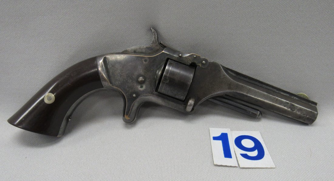 SMITH & WESSON MODEL-1 SECOND ISSUE: .22 CAL. REVOLVER WITH LETTER OF AUTHENTICITY FROM SMITH & WESSON DATED MAY 21, 1971 WRITTEN BY ROY G. JINKS "HISTORICAL CONSULTANT" - FAIR TO GOOD. S/N 125310