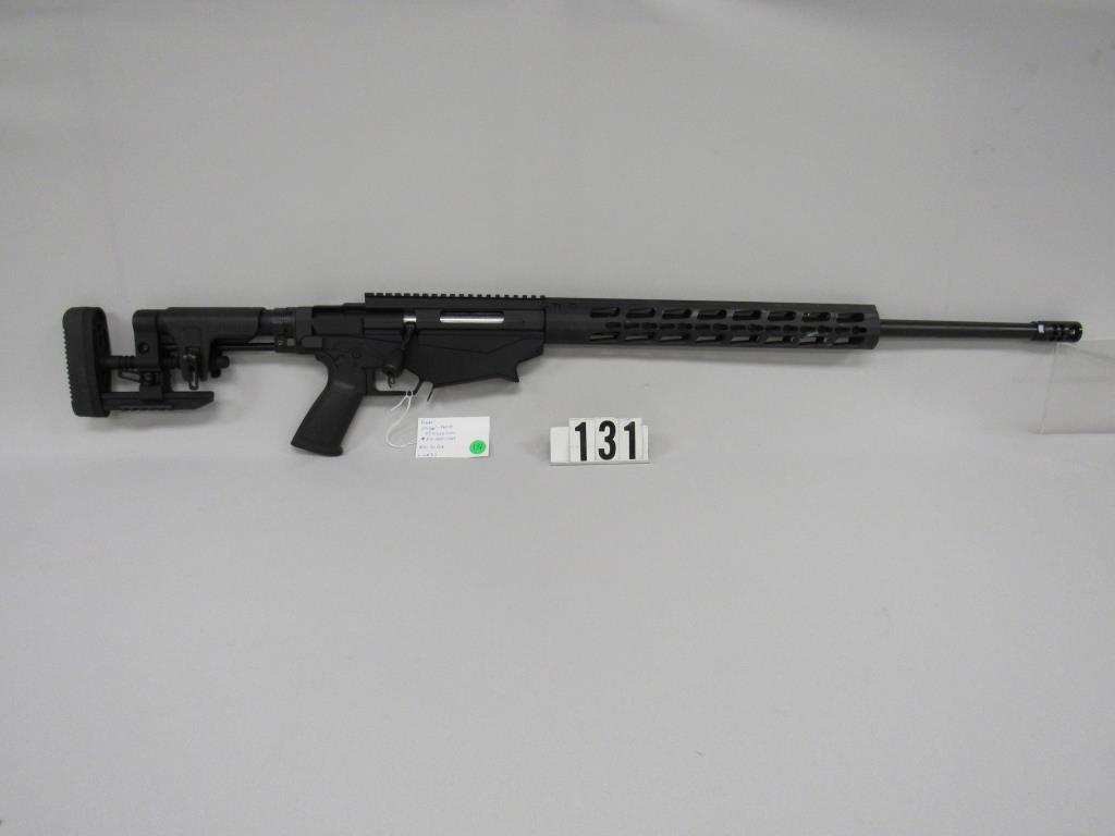 RUGER MODEL-18008 BOLT ACTION TACTICAL,: 6.5 CREEDMOOR CAL. RIFLE. NEW IN BOX WITH BULL BARREL. ADJUSTABLE & FOLDABLE BUTTSTOCK. 2 NEW MAG PULL MAGS, TOOLS BOOKS & PAPERWORK. S/N 1800-71618. LINE #917.