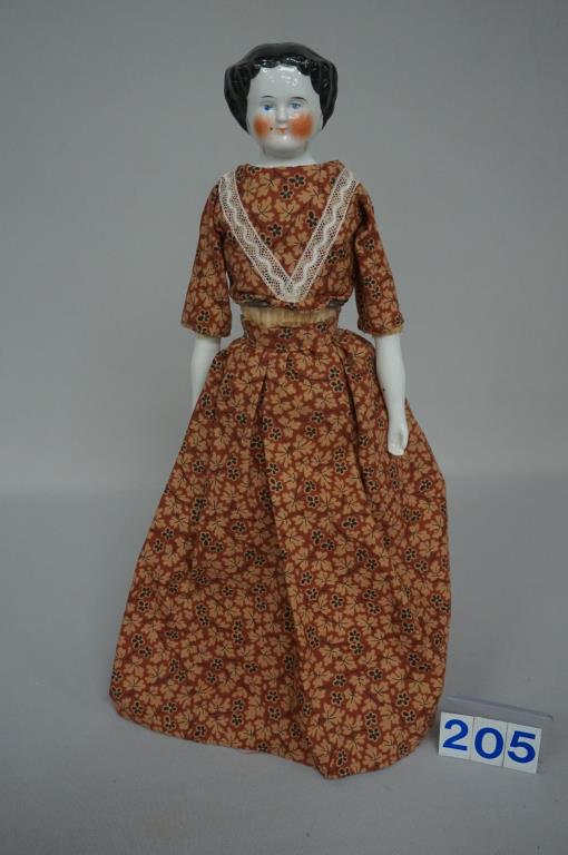 ANTIQUE 15 IN. CHINA HEAD,: FLAT TOP BLACK HAIR WITH CURLS ON SIDES & ACROSS THE BACK, LIGHT PEPPERING MARKS, OLD CLOTH BODY & UNDERGARMENTS, CHINA FOREARMS & HANDS, CHINA LOWER LEGS WITH MOLDED & PAINTED BOOTS, NO DAMAGE OR REP