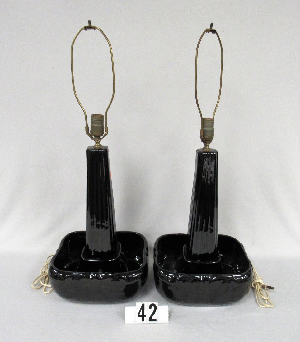 PAIR OF VAN BRIGGLE MID CENTURY LAMPS:: BLACK GLAZE. EACH BASE MEASURES 16 1/2 IN. HIGH & A 11 IN. X 11 IN. BASE